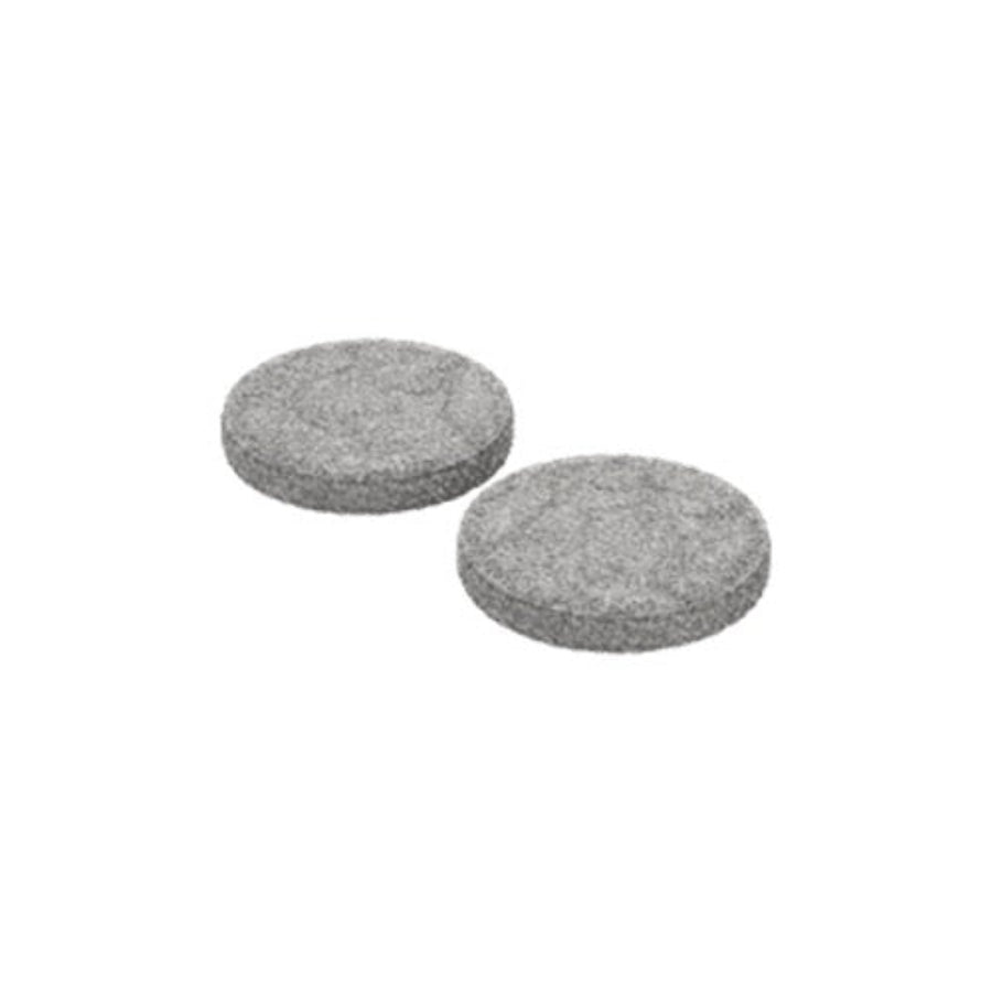 Two gray round felt pads on a white background