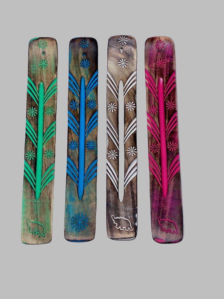 wood painted incense burners on white backround