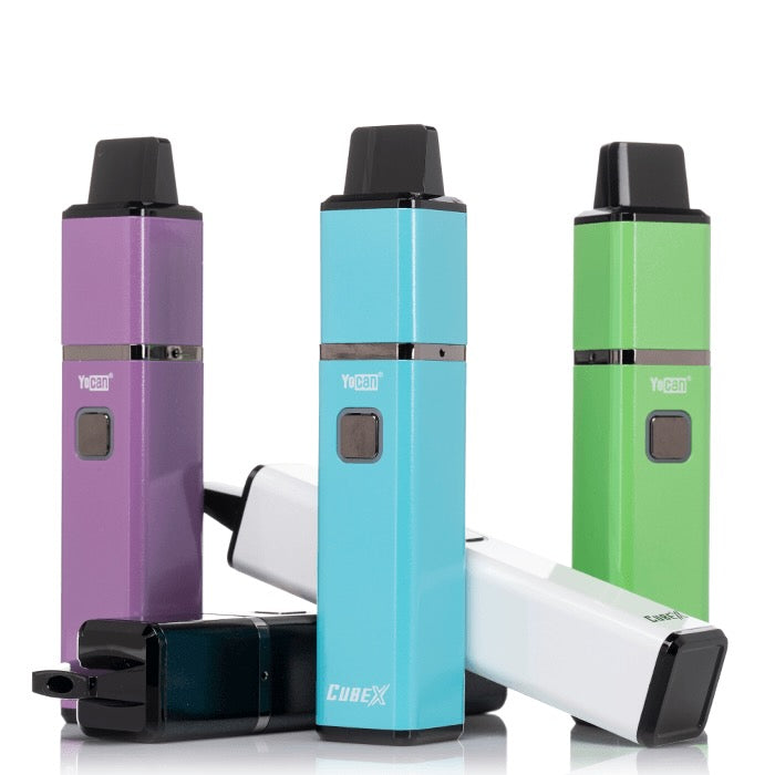 Three vape devices in purple, blue, and green on a white background